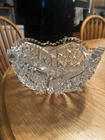 Large American Brilliant Period cut glass bowl showing hobstar pattern and sawtooth rim