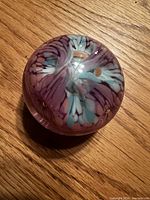 Overall view showing swirling pink and blue design