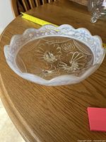 Top view showing scalloped opalescent rim and interior pattern