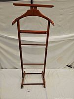 Full view of Fratelli Reguitti wooden valet stand