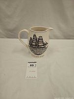 Front view showing ship graphic and overall shape