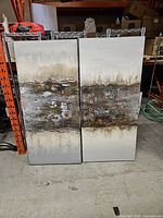 Front view of both paintings side by side