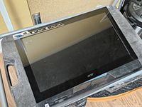 Front view of Acer touchscreen monitor lying flat