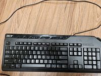 Top view showing entire keyboard layout and attached USB cable