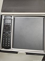 Remote control and media player in original box