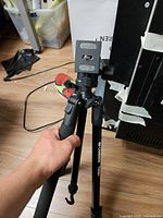 Tripod extended showing legs, center column and quick release platform