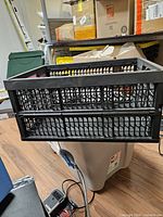 Crate open showing lattice sides and handles