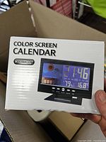 Front of retail box showing product image and model