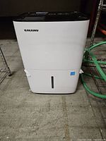 Front view showing SAHAUHY branding, water reservoir slot and overall condition