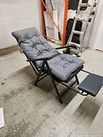 Chair set up showing full recliner with cushion and footrest