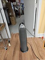 Full front view of Honeywell tower fan showing overall condition and color