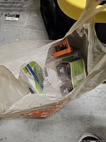 Sealed Leviton 2-pack slide dimmers in Home Depot bag