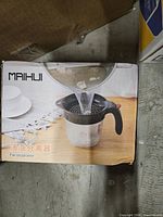 Front of boxed MAIHUI fat separator