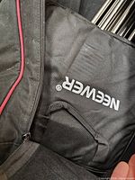 Padded Neewer branded pouch inside main carrying bag