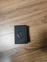 Black presentation box bearing Mercedes-Benz three-pointed star logo