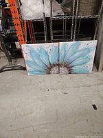 Front view of both canvases showing full floral design