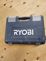 Closed Ryobi hard plastic case