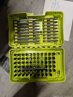 Open case showing full assortment of driver bits and extension