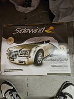 Front of Sidewind car cover box showing brand and product image
