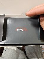Top flap of Slingbox box showing logo