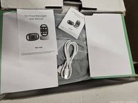 Manual, USB-C cable and sealed contents inside box