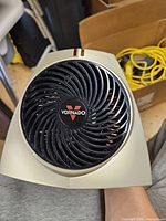 Front view showing Vornado logo, vortex grille and gray-silver frame