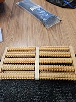 Top view showing full massager with ten rollers