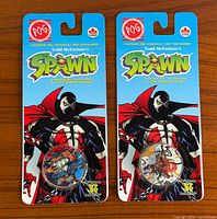 Front view of both sealed Spawn POG packs