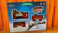 Front of boxed Eluceo 16-piece Christmas train set