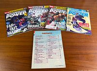 All four Nintendo Power magazines and Super Paper Mario strategy guide
