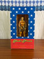 Front view of boxed Wonder Woman Masterpiece Edition set showing figure and star-patterned packaging
