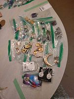 Overview of all bagged jewelry pieces on tabletop
