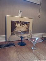Overall lot view showing framed print and two glass bowls