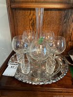 Full set showing decanter, balloon wine glasses, shot glasses on ornate tray