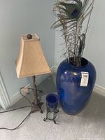 Floor vase, small vase on stand, lamp, feathers overview