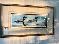 Full view of framed print showing loons image, mats and frame