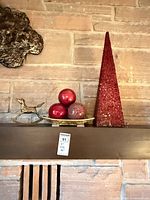 Full lot on mantel showing tree, spheres on tray, rocking horse accent