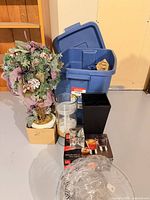 Group shot of topiary, tote, boxed glassware, vases and bowls