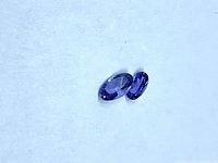 Two oval blue-violet tanzanites side by side