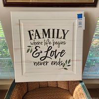 Front view of square wall art sign with family quote