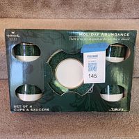 Box front showing Hallmark Sakura Holiday Abundance set of four cups and saucers