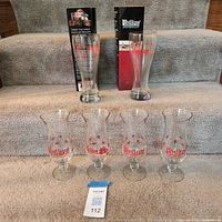 Six Phillips logo beer glasses and tagged lot number