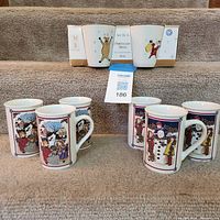 Group shot showing six illustrated mugs and boxed set of four