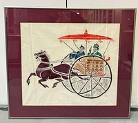 Full view of framed artwork showing chariot scene