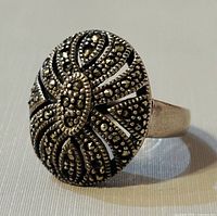 Top view showing oval marcasite setting and pattern