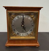 Front view of Elliott London wood mantel clock