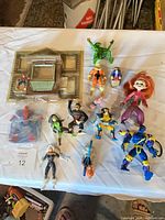 Overview of all figures, facade, accessories on table
