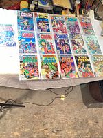 All 15 bagged and boarded Conan comics laid out in three rows