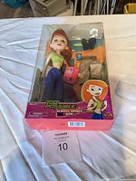 Front of boxed Kim Possible School Spirit fashion doll showing doll and accessories