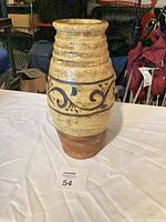 Full view of vase standing upright